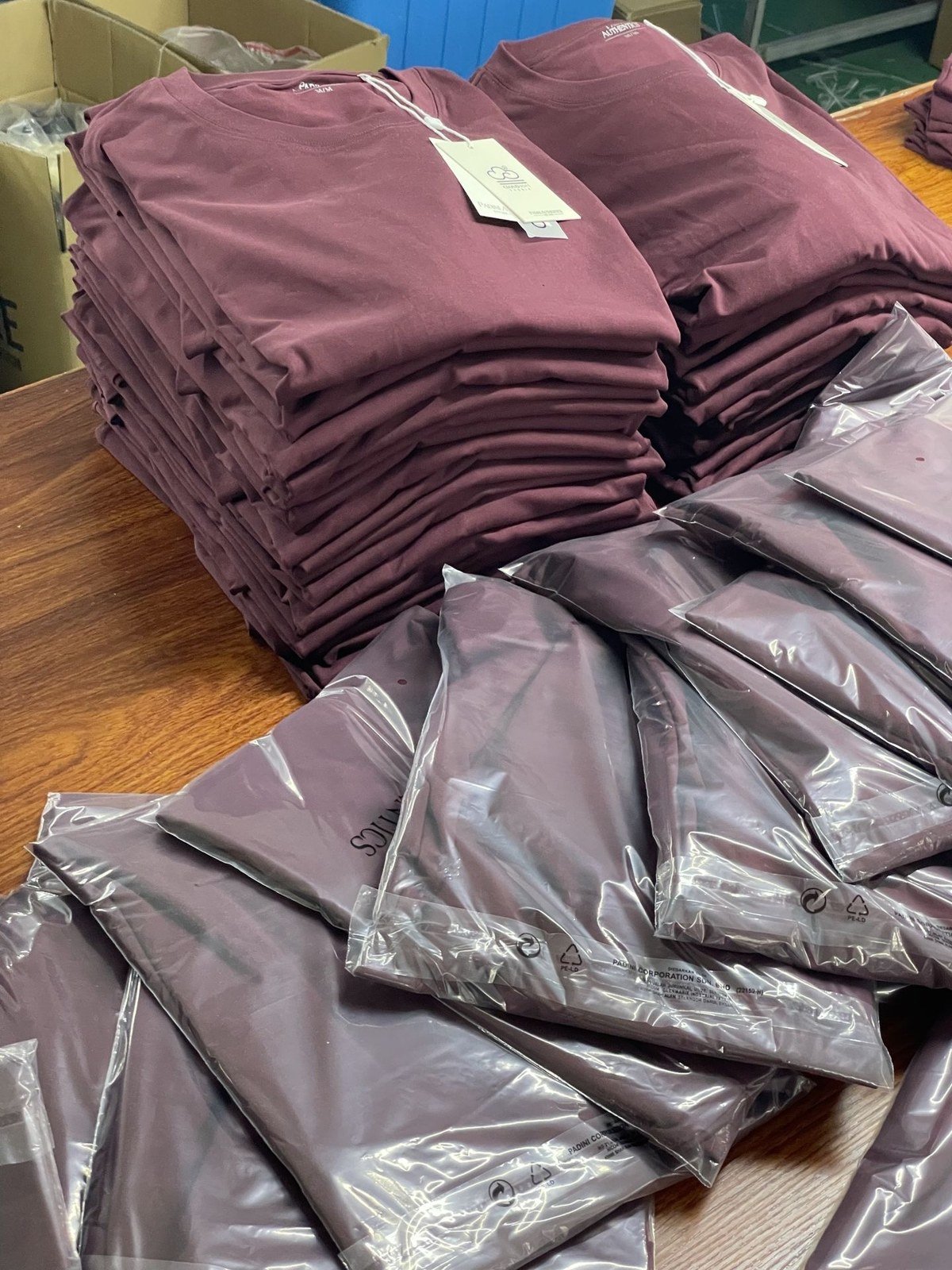 Folded and packaged garments; include finishing and packing in the quotation scope.